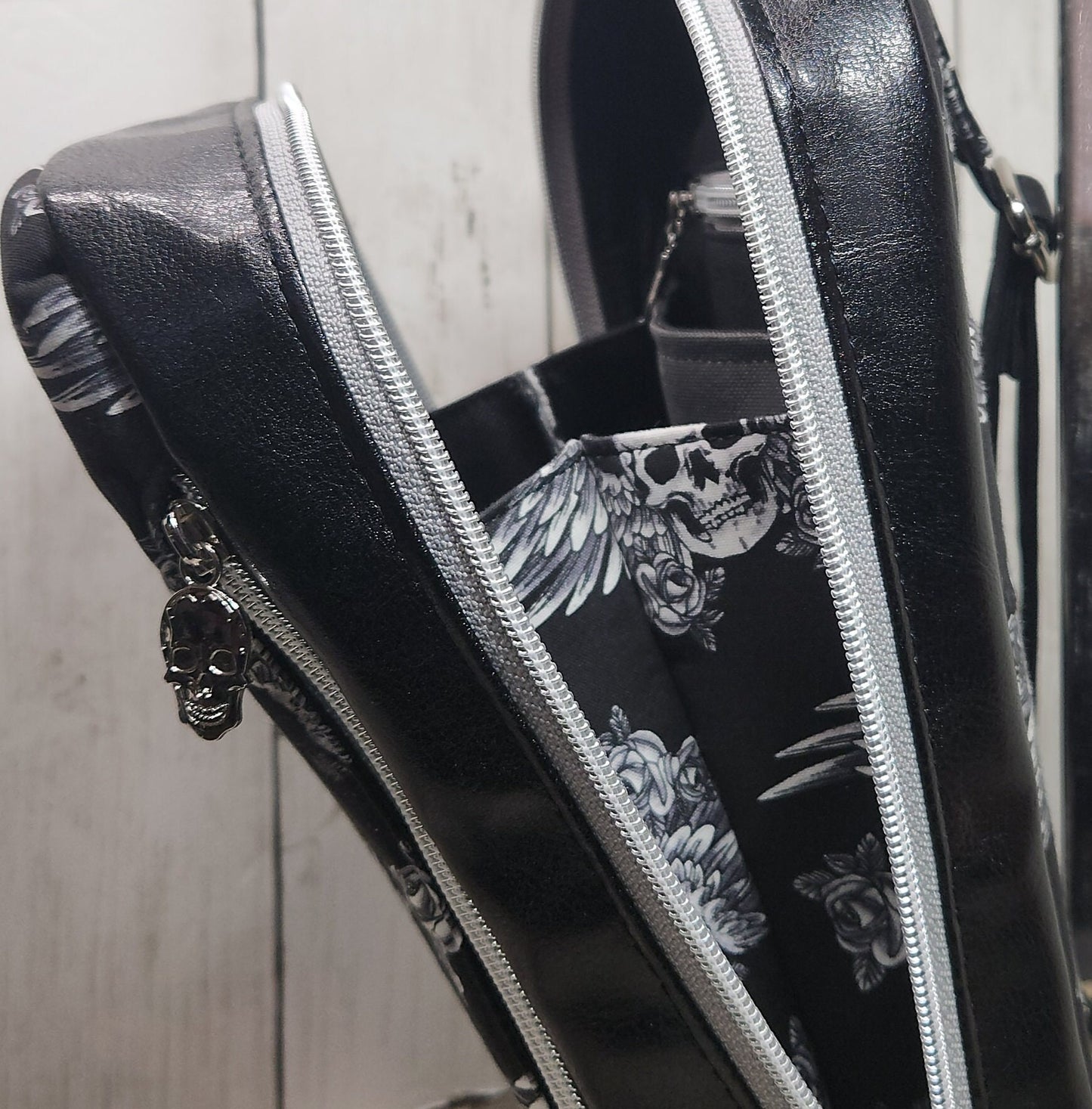Gothic skull sling bag, Handmade one-of-a-kind skull shoulder bag, Skulls with wings, Across-the-body skull-themed bag, Skulls, and roses